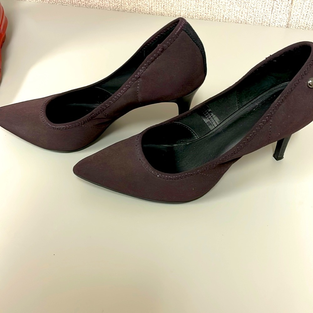 Vera Wang dark purple pumps.